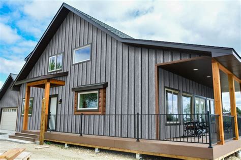 pics of gray houses w/ black metal roof and shutters|grey house designs.